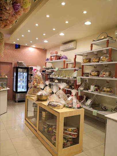 Mini chocolate - Saudi Arabia|شارع الحسن بن علي، الروضة،