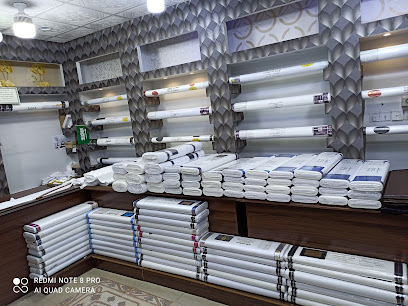 رمز المستشار للخياطة الرجالية - Al Bukayriyah - +966 55 078 8057