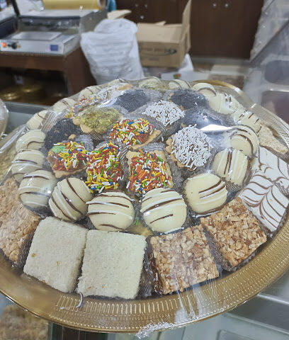حلويات شوكولاتة الحازمي Al Hazmi Sweets & Chocolate - AlQouz - +966 54 848 1020