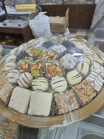 حلويات شوكولاتة الحازمي Al Hazmi Sweets & Chocolate - Saudi Arabia|AlQouz 28849|الشارع العام Main Street